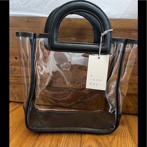 See- through bag. Brand new, never used.